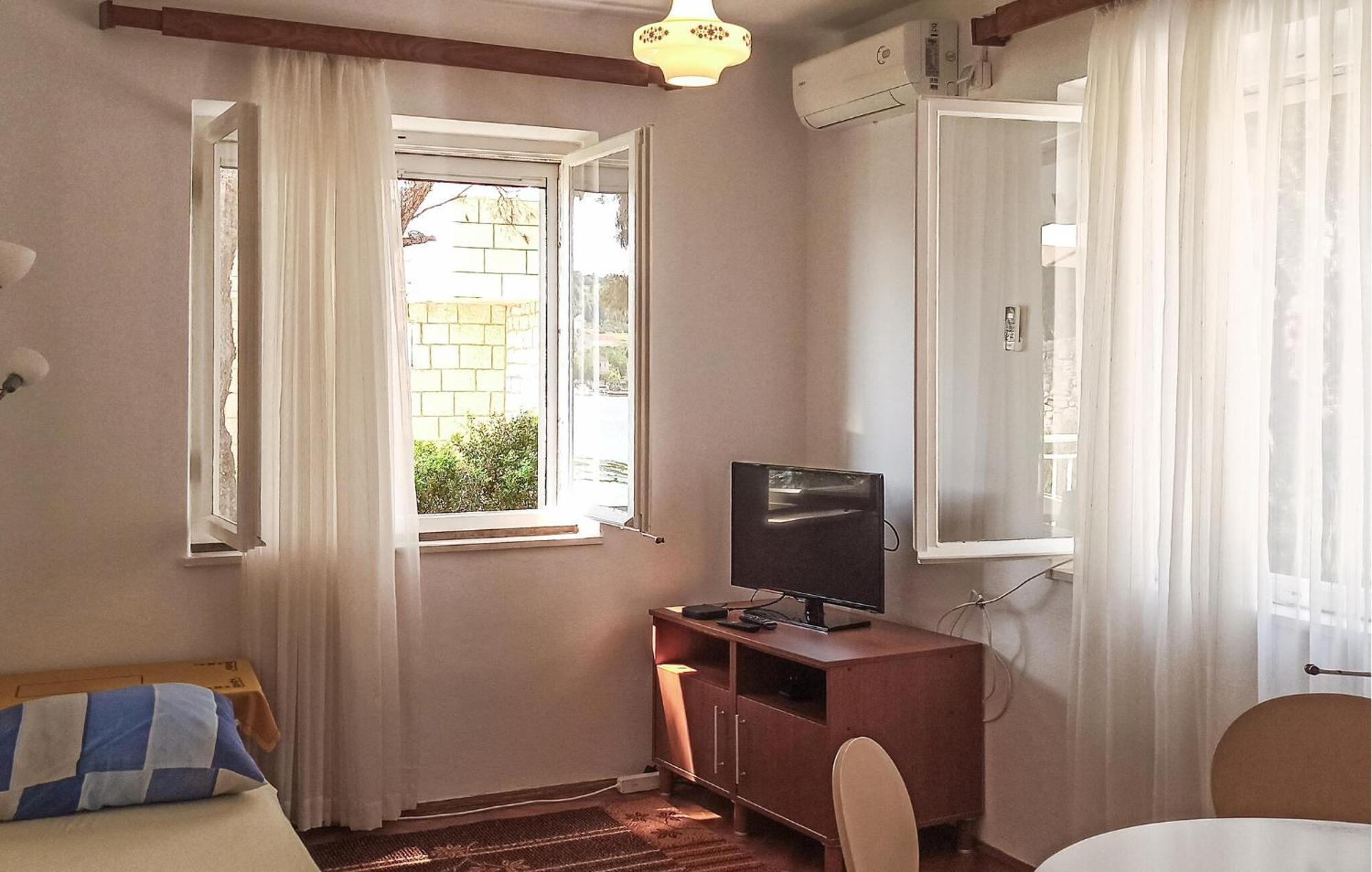 Amazing Apartment In Lumbarda With Kitchen Екстериор снимка